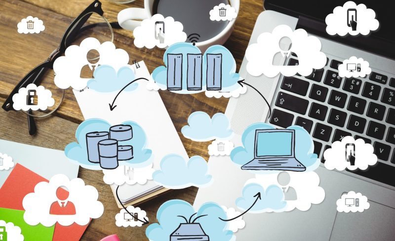 Composite image of business desk with business icons